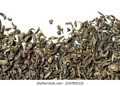 Green tea leaves on white background. Top view. Close up. High resolution