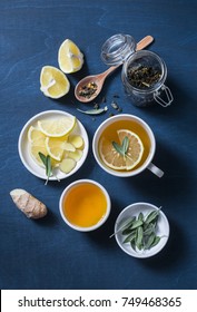 Green Tea With Lemon, Ginger, Sage On A Blue Background, Top View. Healthy Detox Drink. Flat Lay 