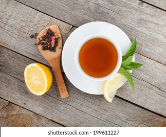 Green Tea With Lemon And Mint On Wooden Table. View From Above