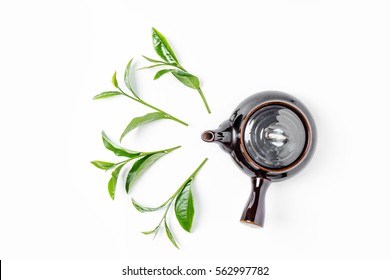 Green Tea In Tea Pot On White Background. Top View