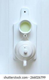 Green Tea In Tea Pot And White Cups, Top View