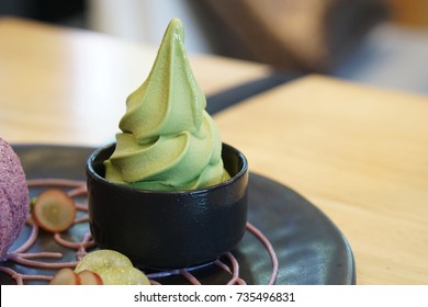 Green Tea Soft Serve Ice Cream, Served In Black Cup, Traditional Japanese Confectionery, Healthy Concept.