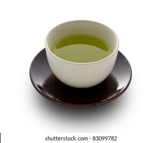 Green Tea In A White Cup On A White Background