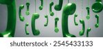 Green telephone receivers hanging over gray background concept for on the phone, customer service, on hold or contact us