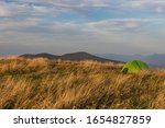 Green tent on Max Patch bald,overlooking Great Smoky Mountains National Park