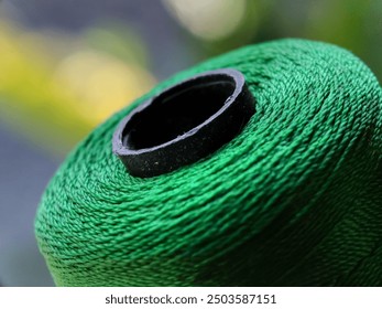 green thread roll texture background