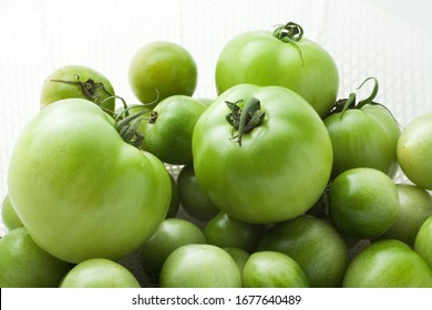 Green Tomato On White Background