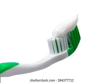 Green Toothbrush With Toothpaste. Isolated On White Background.