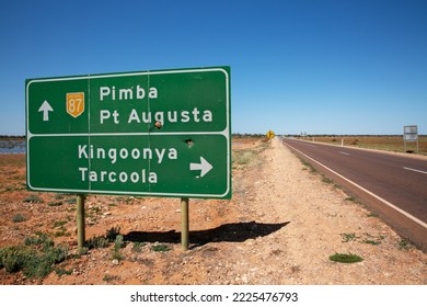 Green traffic road sign the National 87 next to the road in Australia (Pimba  Pt Augusta  Kingoonya  Tarcoola)