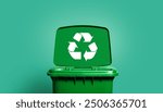 Green Trash bin with recycling Symbol  isolated on green background, earth day concept, recycle