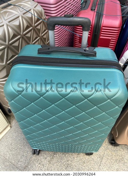 Green
travel vacation suitcase different perspective angles macro shot
travel trip vacation suitcase luggage buying now.
