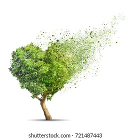 Green Tree Shaped In Heart Disintegrate Isolated Over White Background 