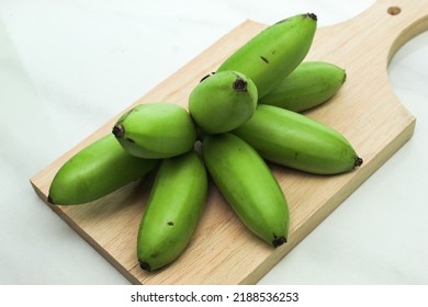 Green Unripe Banana Isolated On White Background