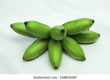 Green Unripe Banana Isolated On White Background