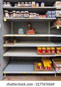Green Valley, Arizona, July 10, 2022. Empty Peanut Butter Shelves At Walmart Grocery Store. Supply Chain Disruption. 