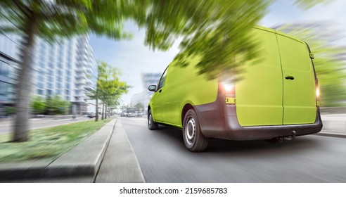 Green Van Driving In The City