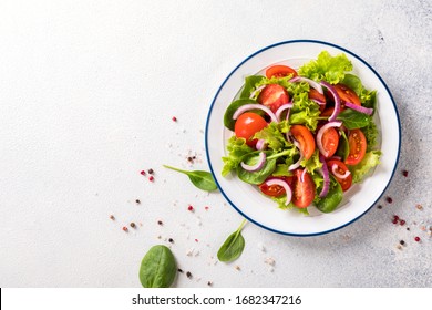Green vegan salad from vegetables and  green leaves mix.Concept for a tasty and healthy meal.Top view.Copy space  - Shutterstock ID 1682347216