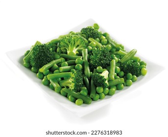 green vegetable mix in a white square bowl on a white background - Powered by Shutterstock