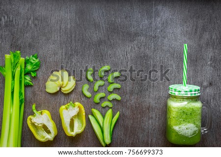 Green vegetable smoothie with celery, ginger and cucumber