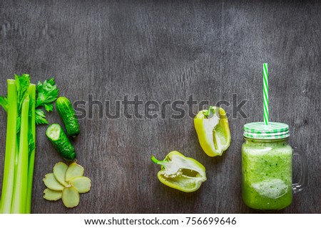 Green vegetable smoothie with celery, ginger and cucumber