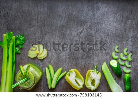 Green vegetable smoothie with celery, ginger and cucumber