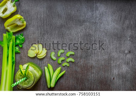 Green vegetable smoothie with celery, ginger and cucumber