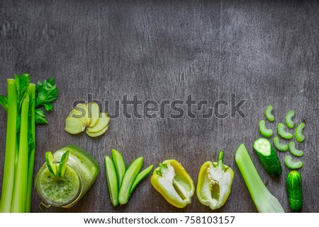 Green vegetable smoothie with celery, ginger and cucumber
