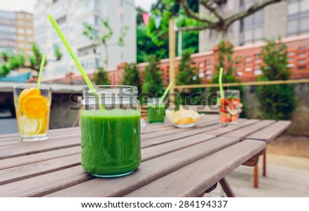 Green vegetable smoothies and infused fruit water cocktails