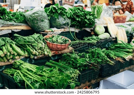 A green vegetables on plastic crates