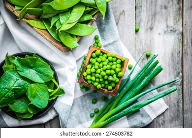 Green Vegetables On Wooden Background