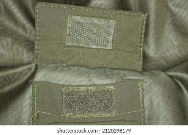 green velcro on the fabric of the army clothing pocket