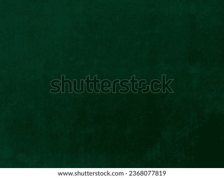 green velvet fabric texture used as background. Empty green fabric background of soft and smooth textile material. There is space for text.