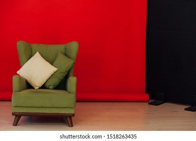 Green Vintage Chair In The Interior Of The Red Black Room