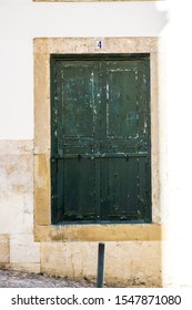 Green Vintage Door With Door Number Four “4”