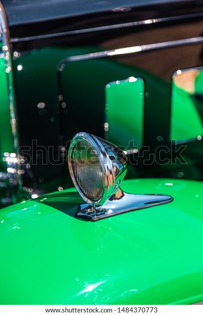 Green Vintage\
old car exterior detail -\
headlight
