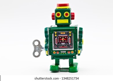 Green Vintage Old Wind Up Toy Robot Isolated On White Limbo Background