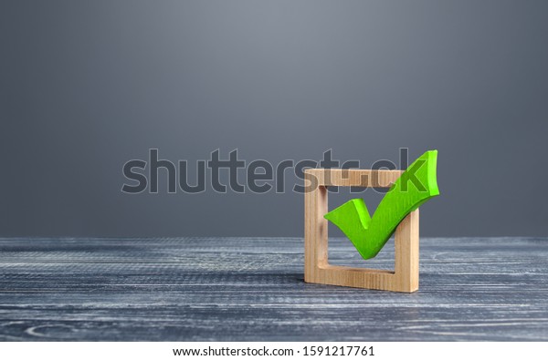 Green voting tick in a box. Checkbox. Democratic\
elections, referendum. The right to choose, change of power.\
Checklist for verification and self-discipline. Necessary quality\
criteria approval symbol