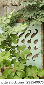 Green wall with decorative elements 