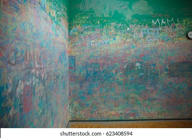 Green wall scribbled with chalk