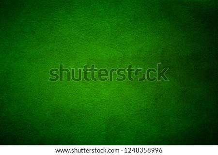Green wall texture for designer background. Artistic plaster. Rough lighted surface. Abstract pattern. Bright backdrop. Raster image.