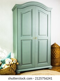 Green wardrobe after renovation and painting in studio