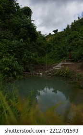 Green Water Lake In Between The Mountains 