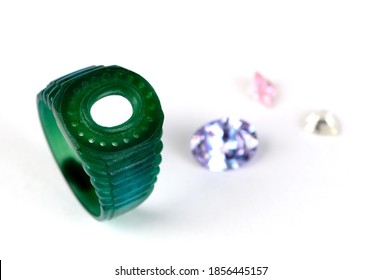 Green wax mold ring jewelry - Shutterstock ID 1856445157