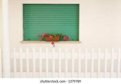 Green window in a white wall - Shutterstock ID 1379789