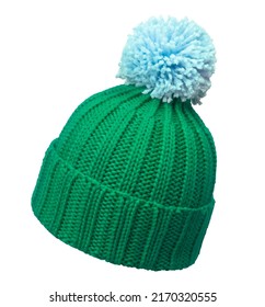 Green Winter Wool Cap With Light Blue Pom Poms, Isolated On White
