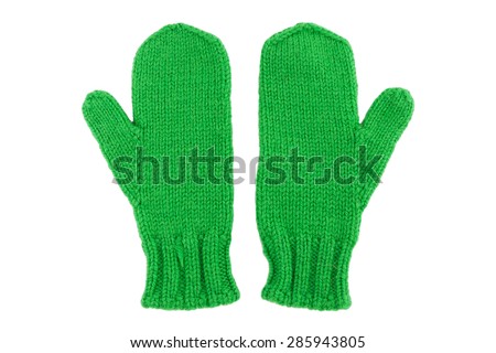 Green wool mittens on white isolated