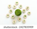 Green World is placed in the center, surrounded by wooden blocks with environment icons. Saving the environment, and being environmentally sustainable. Save Earth. Environment World Earth Day. ESG