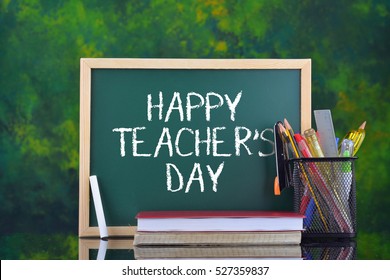 Green writing board with word Happy Teacher's Day