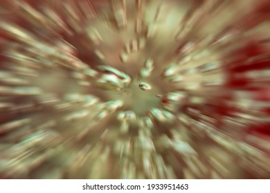 Green and yellow abstract background - radially acceleraed boiling water in a glass pot, Bubbles and splashes blurred.