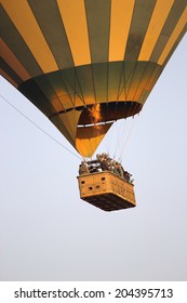 Green And Yellow Balloon Flying Over The Serengeti National Park, Tanzania